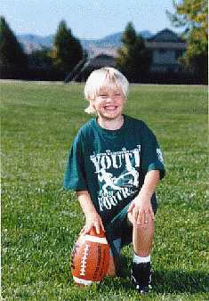 [Picture of Alyssa during flag football]