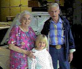 [Picture of Alyssa with my parents]